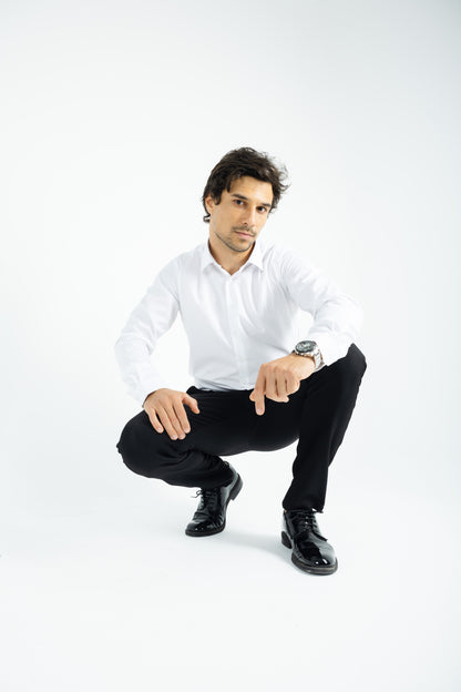 Comford Classic Midnight Black trousers - full-length view of sleek, professional design, Model doing squat, showing pants flexibility 